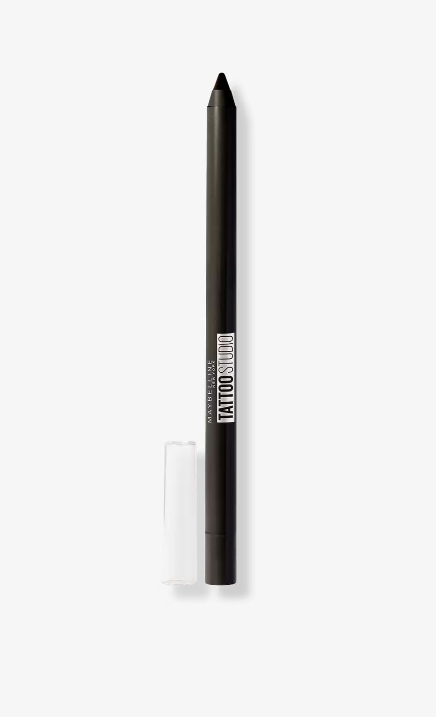 Maybelline TattooStudio Eyeliner pencil in black with a sharp tip and clear cap, standing upright against a plain white background